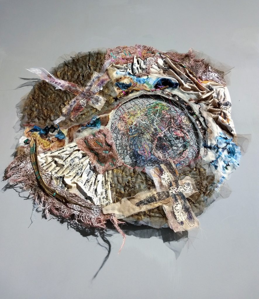 “Dreamcatcher: Wabi V”, 2020, 65 x 55 cm, hand-weaved net, hand embroidery on textile collage, felt, melted chiffon, found objects.